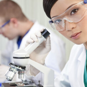 female doctor with microscope
